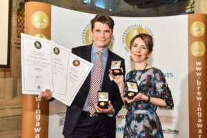 Greg MacNeice of Mac Ivors Cider Co. with his wife Ali celebrating three gold medals in the International Brewing and Cider Awards at the Guildhall in London
