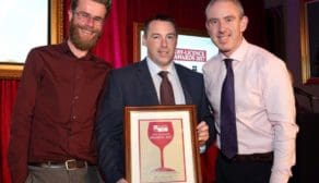 Brian Murphy, McHugh’s Off-Licence, receives the award from Colin Kenny of Diageo Ireland, alongside Frank Haughton of McHugh’s Off-Licence