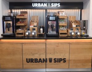 The Urban Sips unit uses “very organic materials like wood, corrugated iron, and the overhead lightbox” to draw consumers’ attention, says Niamh Barry