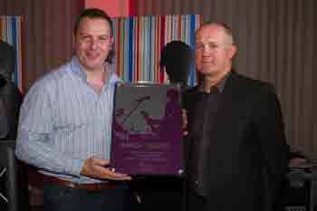 Music to their ears (from left): Rob Monroe is presented with his Live Music Venue of the Year award by IMRO Chief Exectuive Victor Finn.