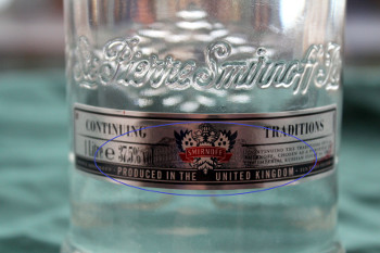 The genuine product states 'Produced in the United Kingdom' on the label