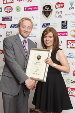 Mark Morgan, ShelfLife, on behalf of award sponsor Universal Graphics, presents the award for Best C-Store Marketing Campaign 2010 to Siobhan Drummond, GlaxoSmithKline for the Lucozade ‘Mobile Phone Back-Up Charger Promotion’