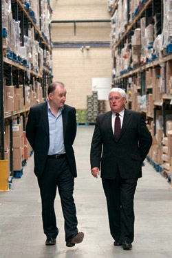 Jim Barry walks Batt O’ Keefe around the new extended warehouse