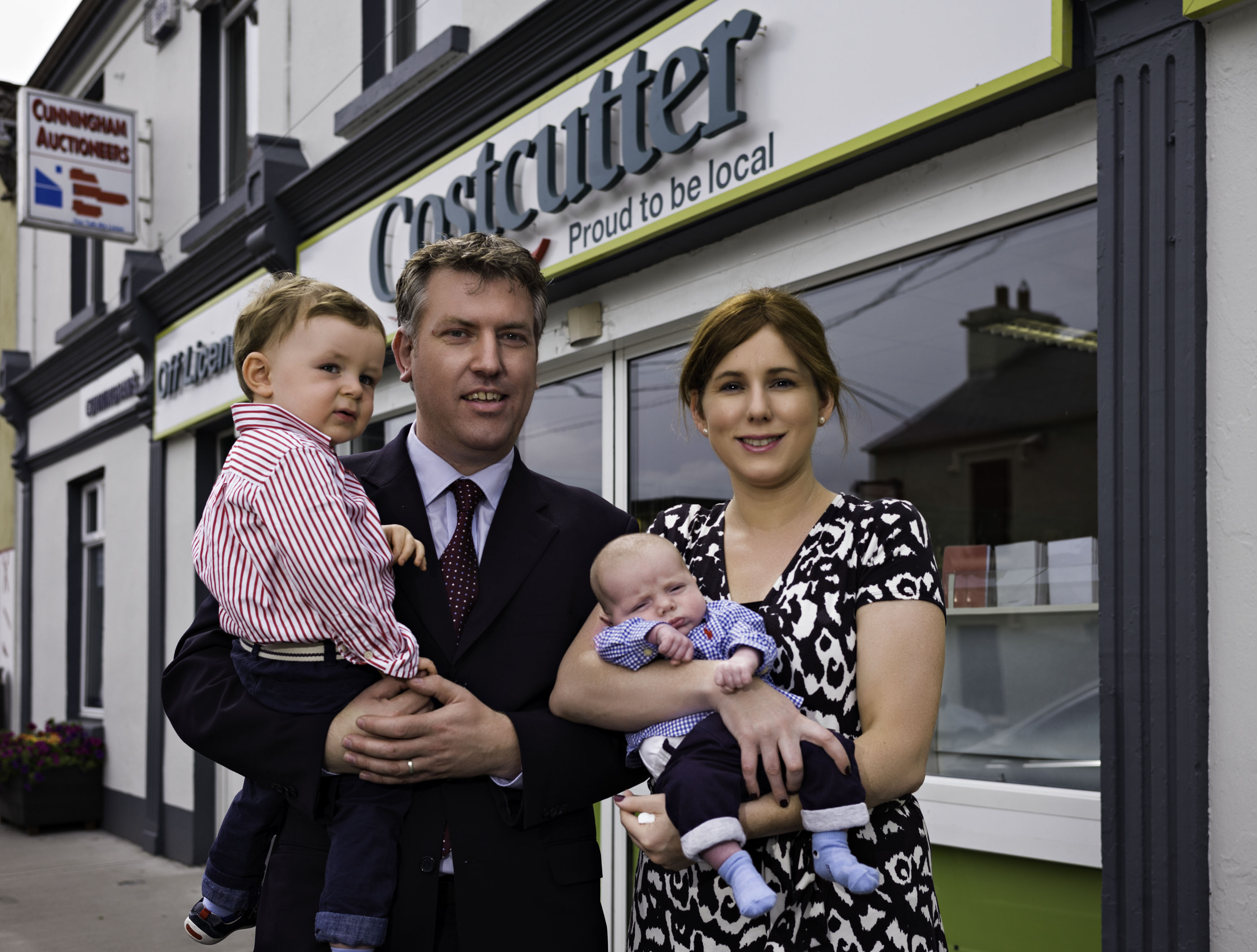 Tomas and Sarah Cunningham with children Jarlath and Joseph outside their newly revamped store