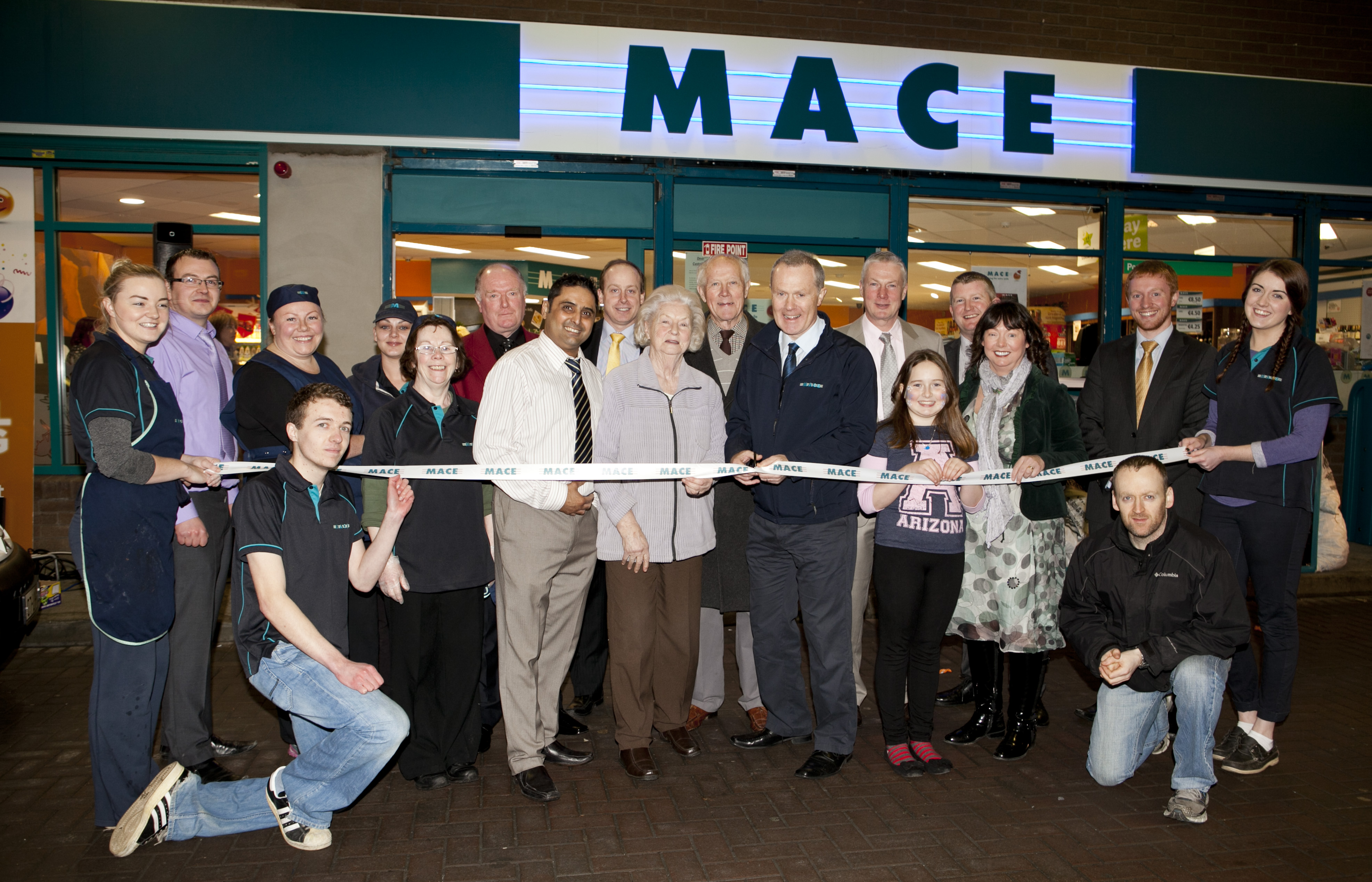 Pat and Áine Flanagan with their team celebrating the most recent revamp on the Dublin Road store in Dundalk