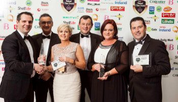 Nigel Scully, head of sales at the National Lottery, David Vaz, circulation manager with the Irish Daily Mail, Peter Jackson, managing director of Aryzta Solutions and Lesley Sweeney of Cuisine de France, present the Supreme Award for National Convenience Store of the Year 2013 to David and Shirley Bagnall from Spar Parkwest