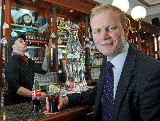 At the launch of The Coca Cola Signature Serve is Coca-Cola Flair Artist Anthony Farrell and Alex Hughes, On-trade Channel Marketing Manager from Coca-Cola.