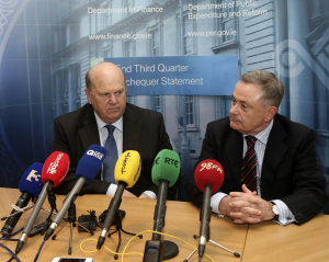 The Minister for Finance Michael Noonan and the Labour Party Minister for Public Expenditure and Reform, Brendan Howlin speaking to the media at the publication of the end of September 2013 Exchequer Returns