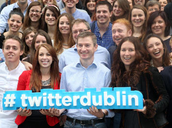 New jobs for Dublin in 2013: Twitter's managing director in Ireland Stephen McIntyre is surrounded by his Dublin based Twitter staff outside their new offices in the Academy on Pearse Street in Dublin city. The company's European HQ has built up a staff of more than 100 people since opening in the city in 2011 and it is planning to create 100 more new jobs