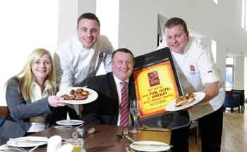 Helping carve out a winner (from left): Unilever Food Solutions’ Customer Marketing Executive Marguerite O'Gorman; rugby ace Tommy Bowe; Unilever Food Solutions Customer Director Jim Reeves and Business Development Chef and head of the Great Carvery of the Year judging panel Mark McCarthy.