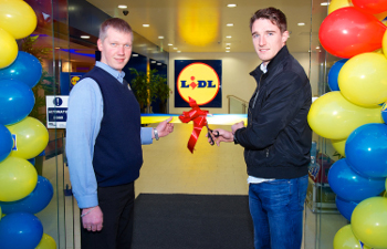 Darius Orsebski, manager of Lidl, The Cornmarket Centre, Cork officially opening the new store with help from Aidan Walsh (Cork GAA player)