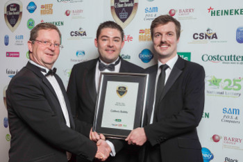 Joe O'Connor, head of sales, Londis, presents the award for Best New C-Store Product Launch 2012 to Jonathan O'Connor and Jonathan Ryan, Kraft Foods, for the launch of Cadbury Dairy Milk Bubbly