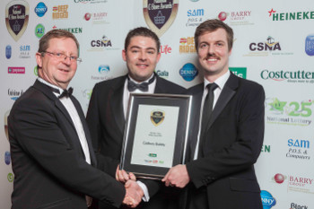 Joe O'Connor, head of sales, Londis, presents the award for Best New C-Store Product Launch 2012 to Jonathan O'Connor and Jonathan Ryan, Kraft Foods, for the launch of Cadbury Dairy Milk Bubbly
