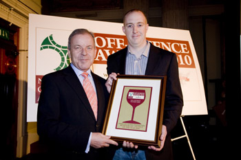 Brian Barry receives award from Kevin Behan, Edward Dillon & Company