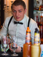 Owen and his award-winning &lsquo;Price&rsquo;s Punch&rsquo; cocktail, this year&rsquo;s Finest Call winner.