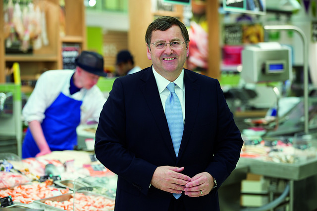 Tesco’s outgoing chief executive Philip Clarke will remain in situ until October when Unilever’s Dave Lewis is to take over