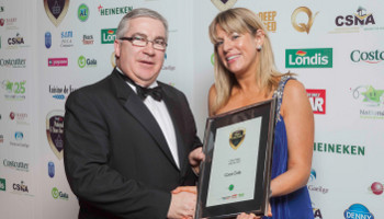 Colm Fitzsimons, business development manager, XL, presents the award for C-Store Product of the Year 2012 to Tara O'Rourke of Coca-Cola