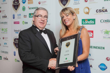 Colm Fitzsimons, business development manager, XL, presents the award for C-Store Product of the Year 2012 to Tara O'Rourke of Coca-Cola