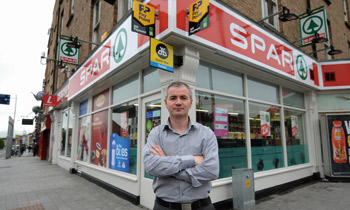 Tadgh Holmes outside his Dorset Stree store in Dublin