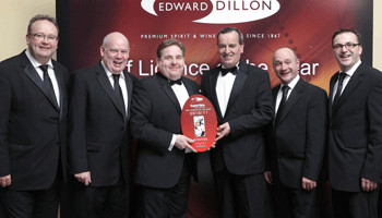 From left: Andy O’Hara from Edward Dillon & Co, Supervau Sales Director Ciaran Levis, Didier Segui and Tommy Grimes from Supervalu Midleton in County Cork, winners of the Edward Dillon Supervalu Off-Licence of the Year Award with comedian Alan Shortt and Brendan Macken from Musgrave Retail Partners Ireland.