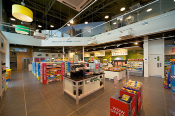The interior of the award winning store features a double height ceiling and upstairs seating area