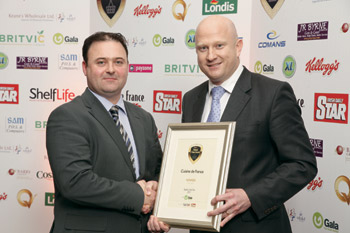Jerry McDonnell, national sales manager, Gala, presents the award for Supplier of the Year 2011 to Cuisine de France operations director David McEnroe