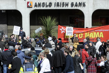 The Socialist Party hold a protest outside Anglo Irish Bank on St Stephen’s Green in Dublin on 1 April after the bank announced losses of nearly E13 billion