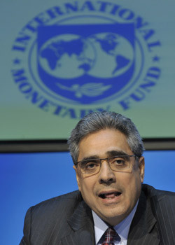 Chop, chop: Ajai Chopra from the IMF at the press conference where it announced that the European Union, IMF and The European Central Bank has approved an €85 billion rescue deal for Ireland