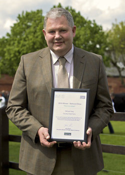 Michael Hoey of Country Crest with his award