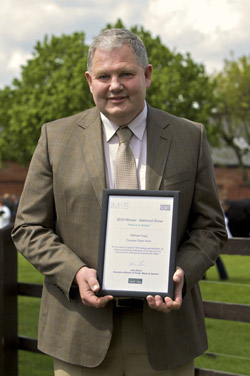 Michael Hoey of Country Crest with his award