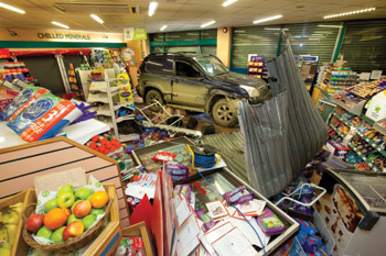 CARNAGE IN THE AILSES: McCullagh's convenience store at Bagenalstown suffered severe damage in the ram-raid, the goal of which was the shop’s Bank of Ireland ATM