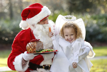 Kayla Cooke presents Santa with his Irish Christmas dinner