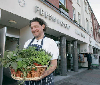 Chef Marco Pierre White standing outside Donnybrook Fair in Dublin 4, which recorded a turnaround performance in 2010 with a profit of E426,000