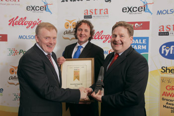 Denis Kelly, Kerryfresh and Paul Henderson, Associated Newspapers, present the award for Manager of the Year  2010 to Tommy Grimes, SuperValu, Midleton, Co. Cork