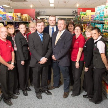Rory and Raymond Hannon with staff of Hannon’s SuperValu Enfield