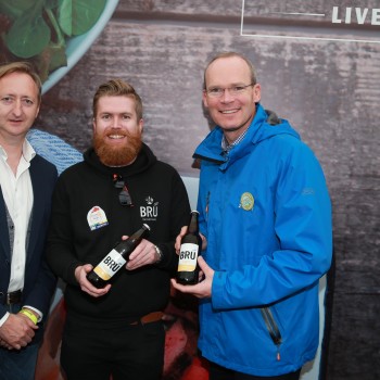 David O'Hara of Bru Brewery. centre, celebrates with Eamon Howell, Trading Director, SuperValu, and Simon Coveney TD