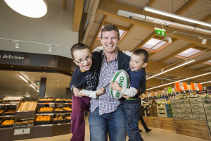 Barrettstown kids Sean (8) and Cian (3) Duggan from Gorey play with Gordon D’Arcy at the new Lidl store which features wider aisles