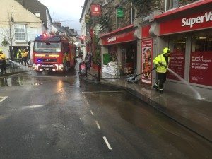 Emergency services attending to the store