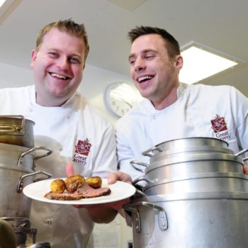 Mark McCarthy with rugby star Tommy Bowe celebrating the great carvery of the year competition's previous winners