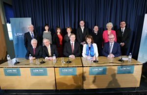 Low Pay Commission family portrait: (front row, left to right) Director of PublicPolicy.ie Dr Donal de Buitleir, Minister for Jobs, Enterprise and Innovation Richard Bruton, An Taoiseach Enda Kenny, Tanaiste and Minister for Social Protection Joan Burton and Minister of State for Business and Employment Ged Nash, (back row, left to right) chief executive, Maxol Group Tom Noonan; director, Migrant Rights Centre, Edel McGinley; director, HR Suite, Caroline McEnery; economics lecturer, WIT Business School, Mary Mosse; professor of economics, NUI Maynooth, Donal O'Neill; CEO, CSNA, Vincent Jennings; Siptu’s Patricia King and Mandate’s Gerry Light