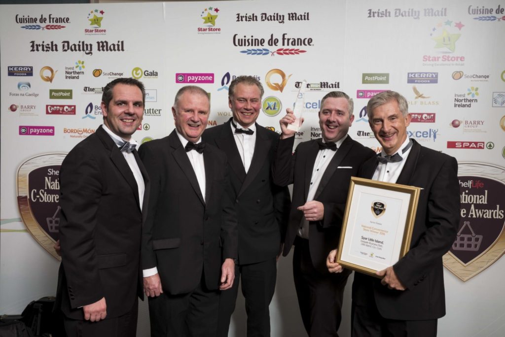 Nigel Scully of Aryzta Food Solutions, Michael Curran of DMG Media Ireland and Dermot Griffin of Premier Lotteries Ireland, present the award for National Convenience Store of the Year 2016 to Spar sales director Colin Donnelly and managing director of BWG Foods Willie O'Byrne, on behalf of the winner, Spar Little Island in Co. Cork