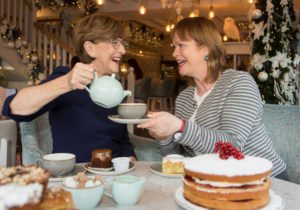 Breast Cancer Research chairperson, Miriam Hand and RTE’s Teresa Mannion enjoying some festive treats at the launch of ‘Nollaig na mBan’ (Photo: Martina Regan)