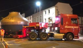 Enormous articulated lorries transport three brand new copper pot stills to Midleton's historic distillery