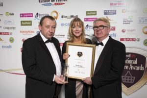 Tara Buckley accepts the Convenience Champion 2016 award from ShelfLife publisher John McDonald with RGDATA president Colin Fee