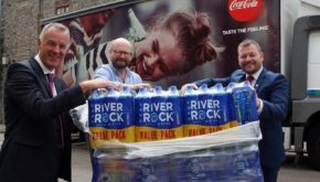 Pictured with Senator Nash, helping to unload the delivery are Coca-Cola HBC representatives Paul McDonnell (L) and David Mulholland (R)