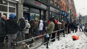 A queue of people waiting to get supplies outside Tesco in Ballsbridge in Dublin on Friday, 2 March