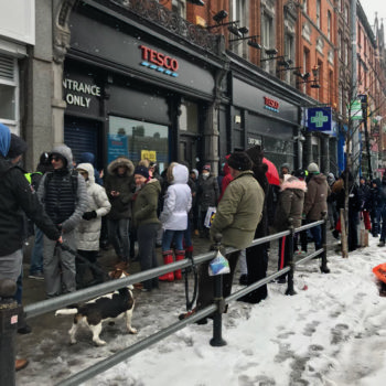 A queue of people waiting to get supplies outside Tesco in Ballsbridge in Dublin on Friday, 2 March