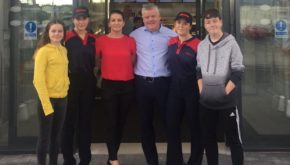 Proud retailer Ken Foley poses with his family and team members outside the new Donegal Supermacs Service Station