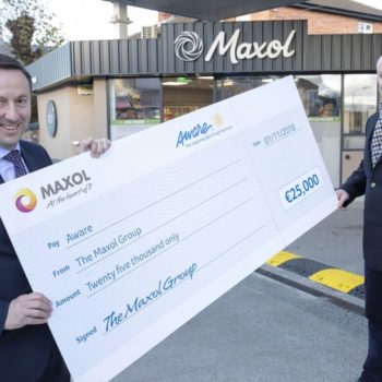 Brian Donaldson, CEO, The Maxol Group presents €25,000 cheque to Drew Flood, Business Development Executive, Aware