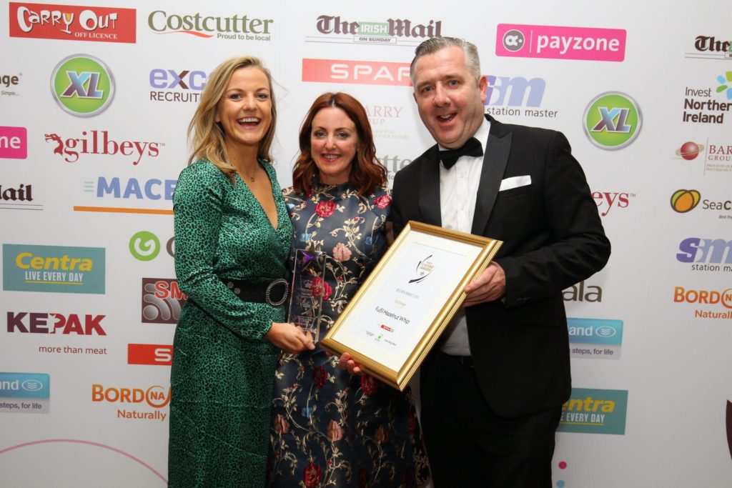 Orla O’Brien and Catherine Hayes receive the award for C-Store Best New Product of the Year 2018 on behalf of Fulfil Hazelnut Whip, presented by Colin Donnelly, sales director, Spar